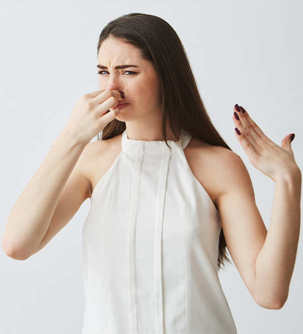 Women Holding Her Nose Due To Bad Smell